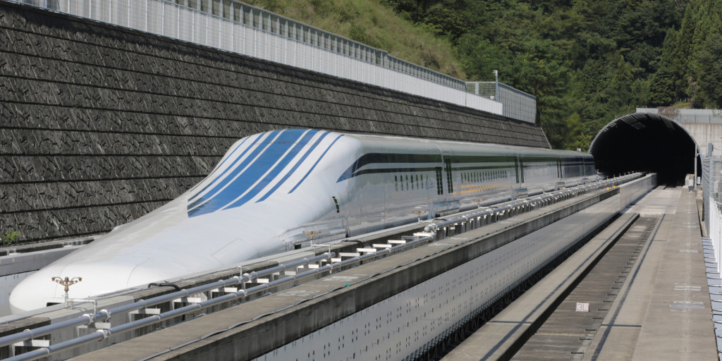 The L0 (L zero) series magnetic-levitation train, developed by Central Japan Railway Co., sits parked on a test track at the control center before a trial run in Tsuru City, Yamanashi Prefecture, Japan, on Thursday, Aug. 29, 2013. Japan resumed trial runs for the world's fastest magnetic-levitation train that will complement the Shinkansen bullet-train network when ready in 2027. Photographer: Yuriko Nakao/Bloomberg via Getty Images